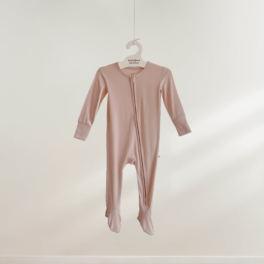 Number Twelve Bamboo Footies in Bloom, flat lay