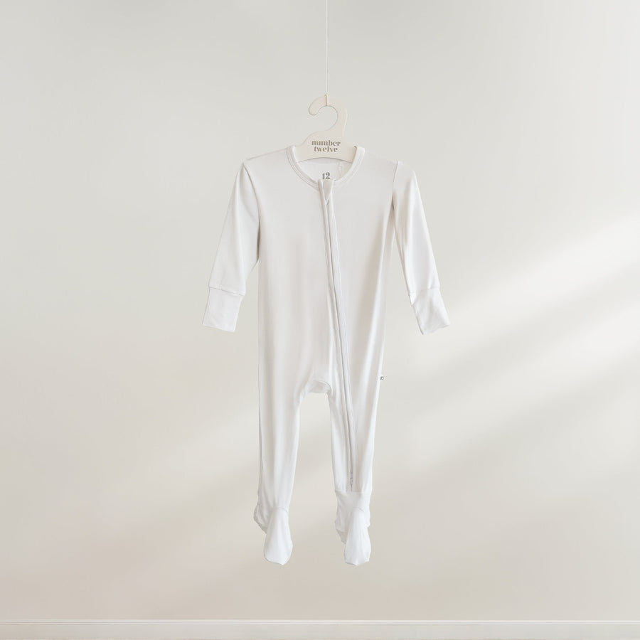 Number Twelve Bamboo Footies in Snow, flat lay