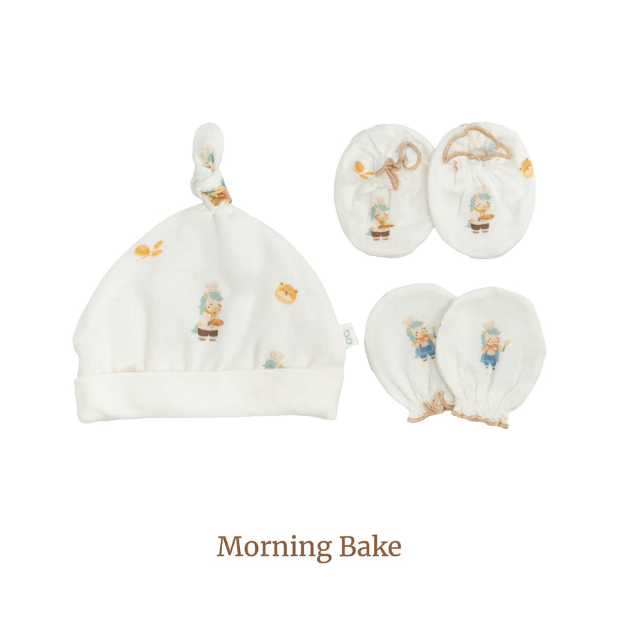 Granny Ben Chuchu's Little Oven mittens, socks and newborn hat set in the Morning Bake print