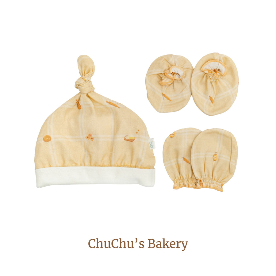 Granny Ben Chuchu's Little Oven mittens, socks and newborn hat set in the Chuchu's Bakery print