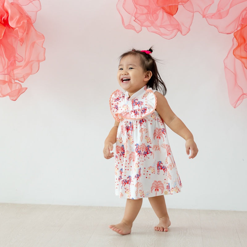 Zodiac Series - Baby Girl Jersey Dress in Red Carnival Horse Print