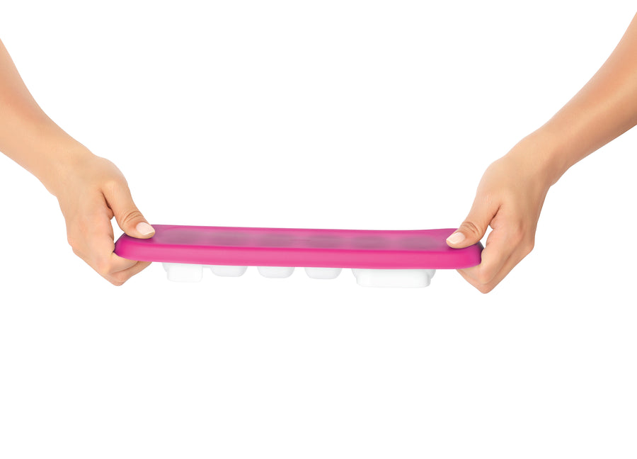 OXO Tot Baby Food Freezer Tray with the pink silicone lid being flexed off