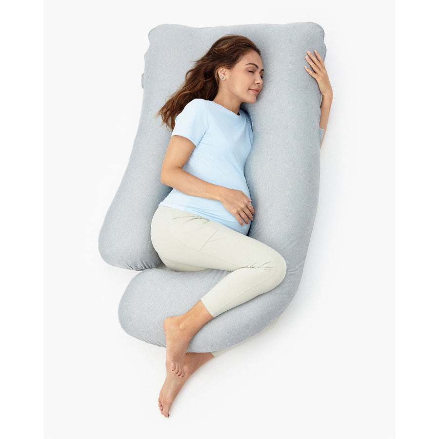 Momcozy U Shaped Cooling Fabric Pregnancy Pillow in blue, shown with a pregnant woman side sleeping inside it