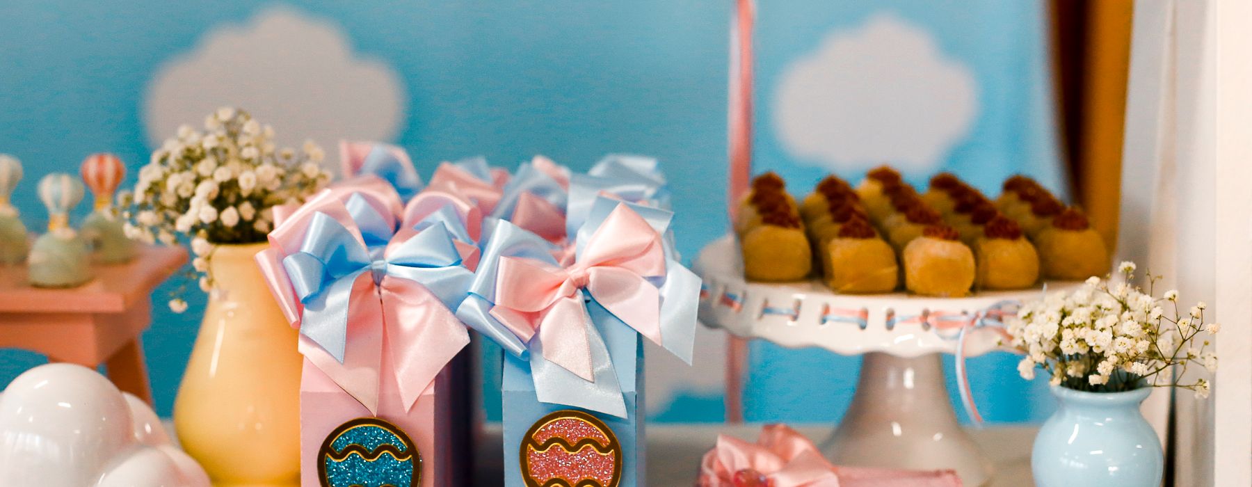 Pastel-styled baby shower gift table