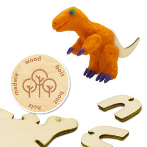 Child modelling dinosaurs with SES Creative dough
