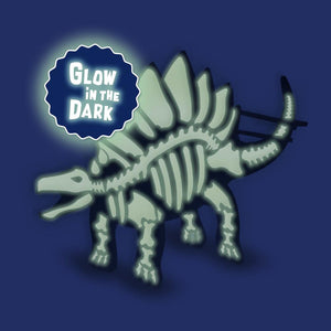 Child building the SES Creative wooden glow in the dark dinosaur