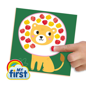 Toddler making fingerprint animals with SES Creative finger paint
