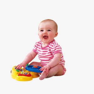 Baby playing with the detached driver panel