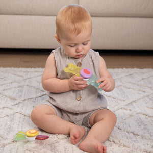 Baby playing with Infantino Sweet Treat Spinners