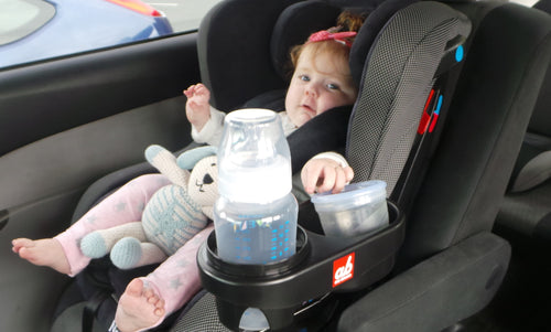 ab New Zealand portable snack and drink holder fitted to a car seat