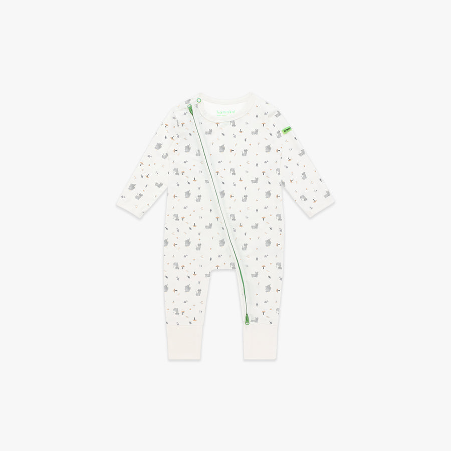 Hamako Tencel Zipsuit in the Paw Paradise print, flat lay