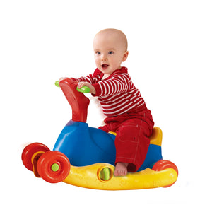 Toddler riding the VTech Grow and Go Ride On