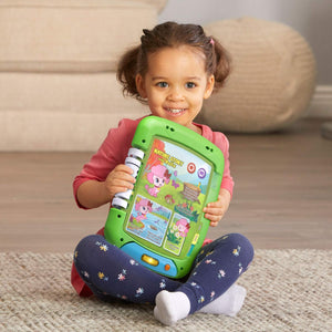 Child holding the LeapFrog 2-in-1 Touch & Learn Tablet