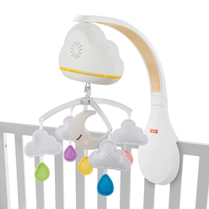 Calming Clouds mobile attached to a cot rail