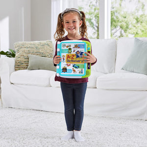 Child holding the LeapFrog A to Z Learn With Me Dictionary
