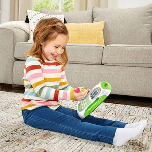 Child writing on LeapFrog Mr. Pencil's Scribble, Write & Read