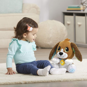 Child talking to the LeapFrog Speak & Learn Puppy
