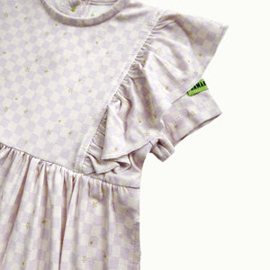 Detail of the frill shoulder on the Hamako Stary Gingham Frill Dress