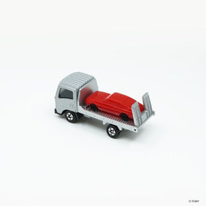 Tomica AO-02 Isuzu Elf transporter showing the rear loading ramps folded down