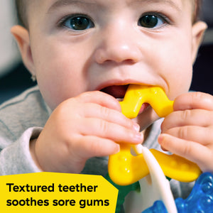 Baby chewing a textured teether from the Sea of Sensory set