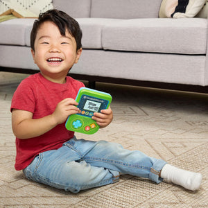 Child holding the LeapFrog Preschool Game & Go