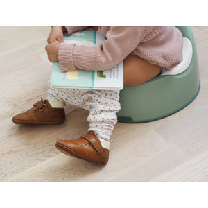 BEABA training potty sage green in a bathroom