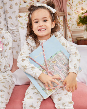 Child holding the Atelier Choux Monceau Mansion Gift Box
