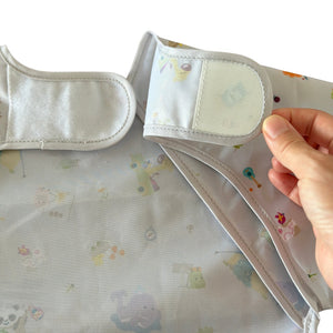 Marcus & Marcus long sleeve baby bib, velcro neck closure
