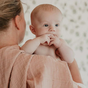 BIBS Muslin Swaddle Blush in use