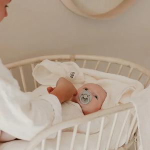 BIBS Muslin Swaddle Ivory in use