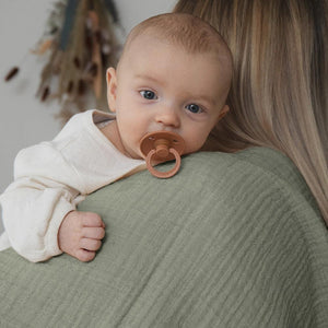 BIBS Muslin Swaddle Sage in use