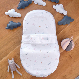 Red Castle Cocoonababy nest, Happy Fox cover, shown from above