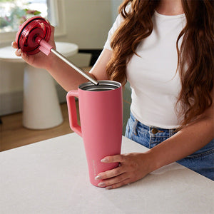 Lifting the ColdKey™ stainless steel straw out of a BruMate Era tumbler