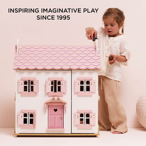 Child playing with Le Toy Van Sophie's Dolls House