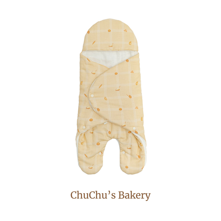 Granny Ben Chuchu's Little Oven Quick Change Travel Swaddle in the Chuchu's Bakery print