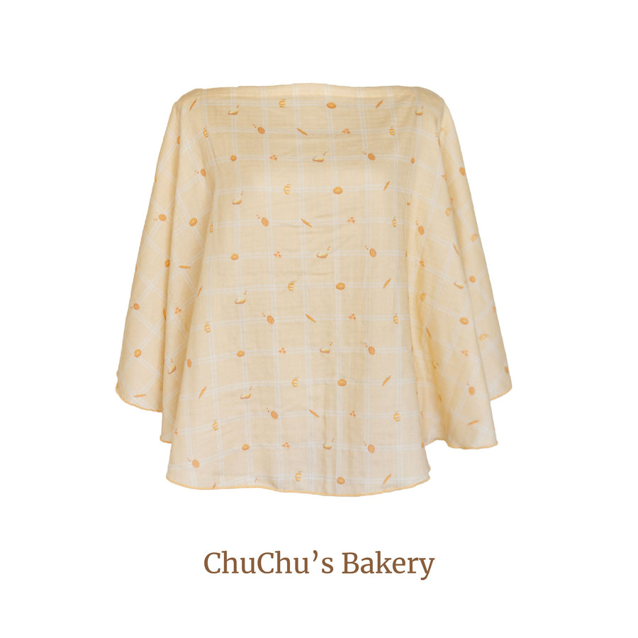 Granny Ben Chuchu's Little Oven TENCEL muslin poncho in the Chuchu's Bakery print