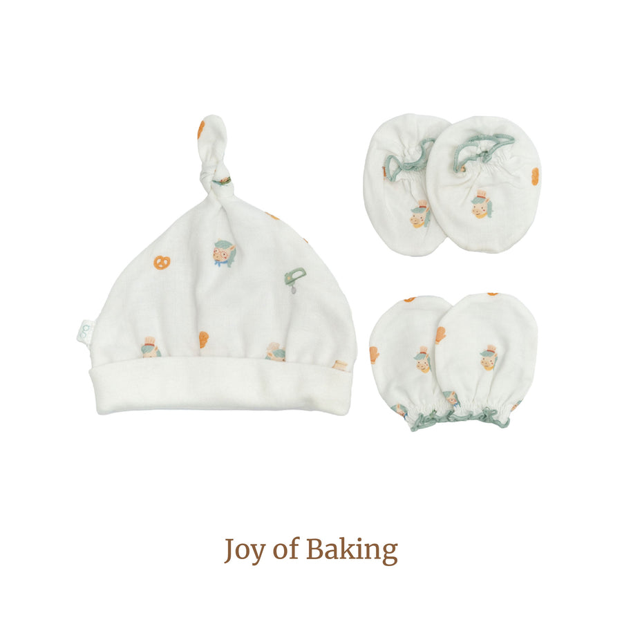 Granny Ben Chuchu's Little Oven mittens, socks and newborn hat set in the Joy of Baking print