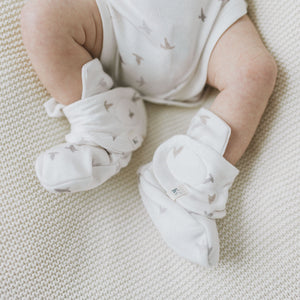 Close-up of Kays+Kins Avian print bamboo cotton booties