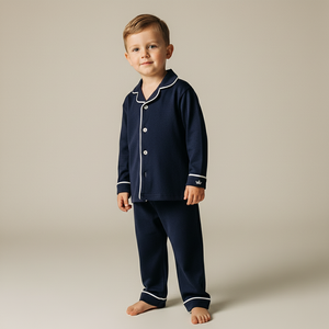 Child wearing the Count & Countess Urban Navy Pima pyjama set
