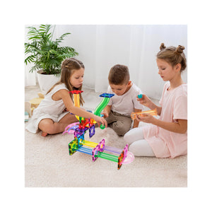Children building with the PicassoTiles 40pc Marble Run