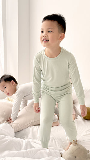 Toddler wearing Number Twelve Bamboo Pyjamas in Pistachio