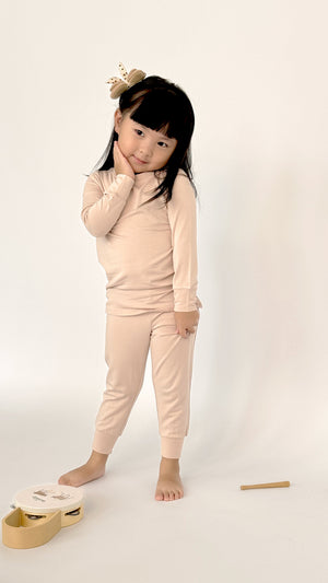 Toddler wearing Number Twelve Bamboo Pyjamas in Bloom