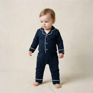Baby wearing the Count & Countess Urban Navy Pima romper sleepsuit