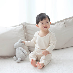 Toddler wearing Twinkle Planet Purely Natural long sleeve pyjamas