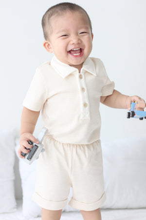 Child wearing Twinkle Planet Brown Stripe polo shirt