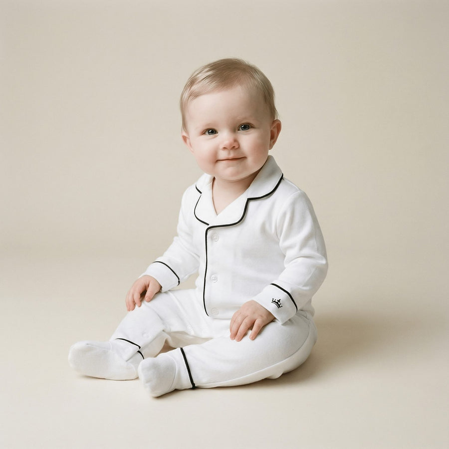 Baby wearing the Count & Countess Classic White Pima romper sleepsuit