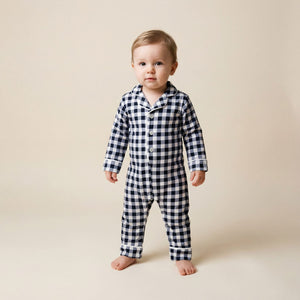 Baby wearing the Count & Countess Navy Gingham Pima romper