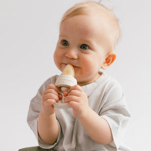 BIBS Baby Feeder Ivory in use