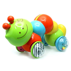 B kids Zoom Zoom Buggy caterpillar showing the striped visual-tracking front wheel and rattle-bead rear wheel