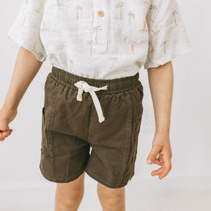 Side cargo pocket detail on Kays+Kins Pebble shorts